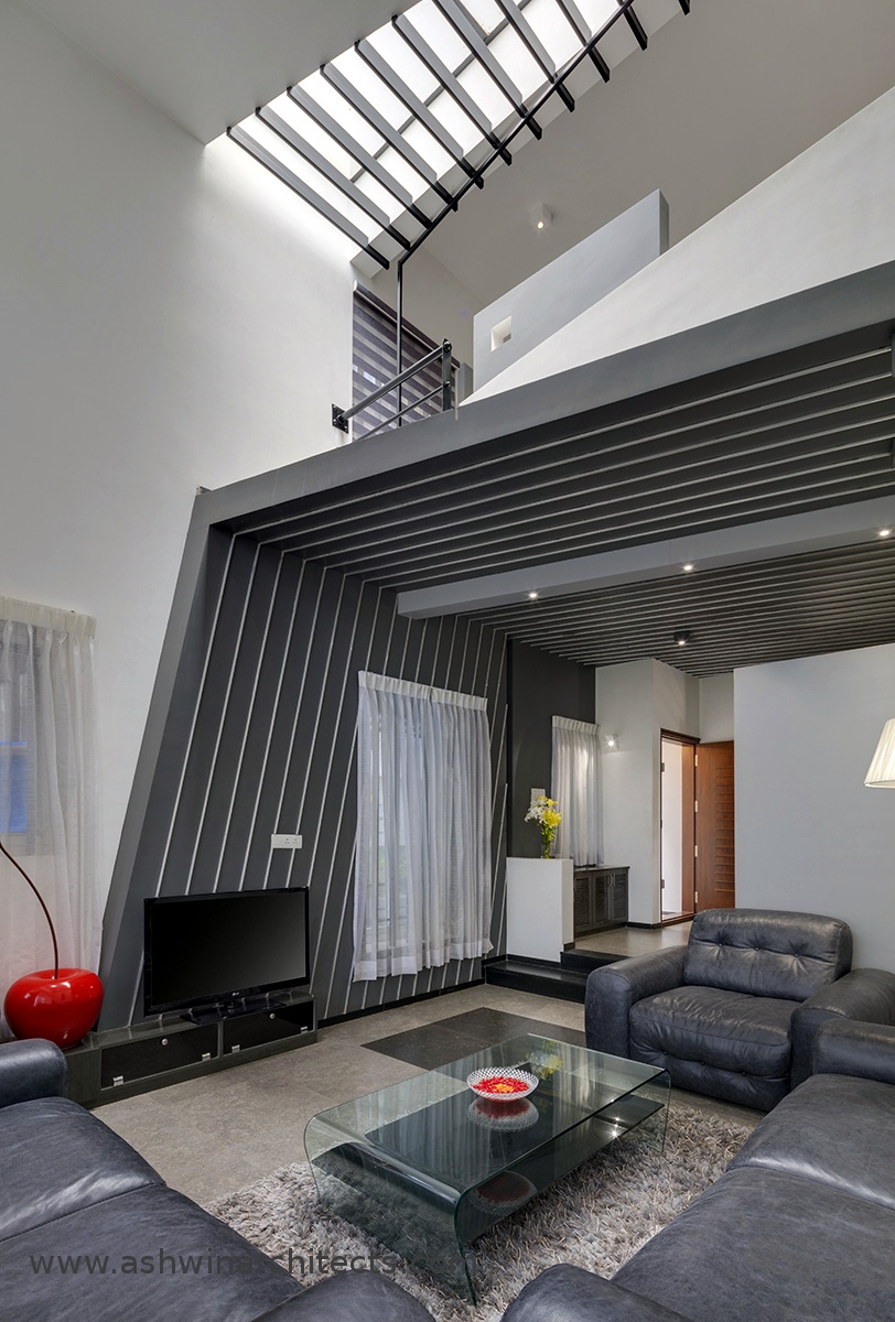 slokesh-60x40-plot-residence-daylight-living-room-interior-designs