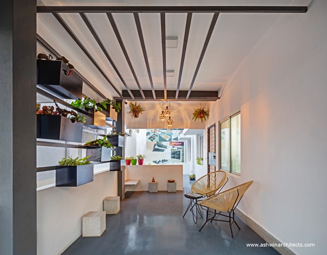 retail-architecture-1000sft-wardrobe-kitchen-showroom-design-sitting-min